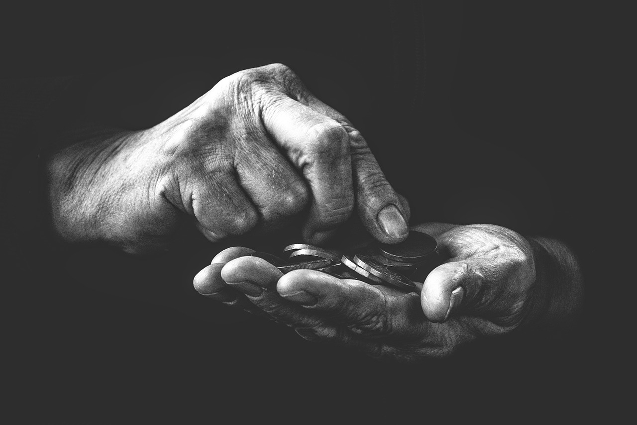 hands holding money